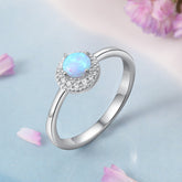 Round Blue Opal Zircon Crescent Halo Sterling Silver Ring